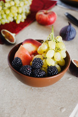 full fruit breakfast bowl Grapes peach blackberry figs Healthy food