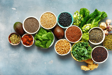 Vegetarian healthy food raw seeds cereals beans superfoods green vegetables