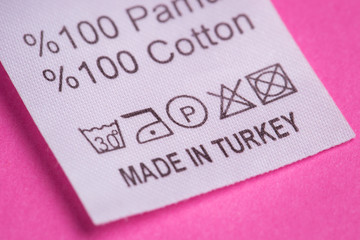 made in Turkey, the inscription on a tag on a pink background