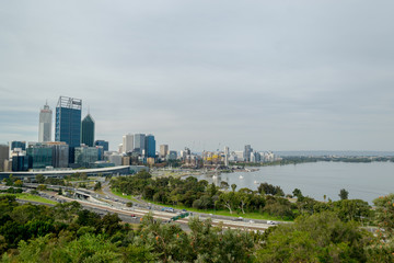 Perth City Skyline panorama during day time with sky scrappers, roads and river taken from King's park