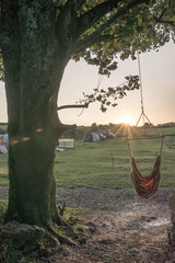 Hammock at sunset at the Becks Bay Campsite near Tenby in South Wales. 