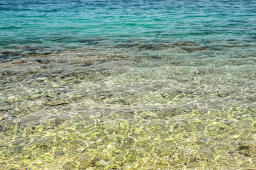Fototapeta na wymiar Sea water background. Sea or ocean mock up. Nature background of transparent sea water.