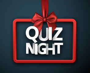 Quiz night blue sign with red satin bow.