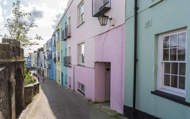 Fototapeta na wymiar Pastel coloured houses in the Pembrokeshire town on Tenby in South Wales