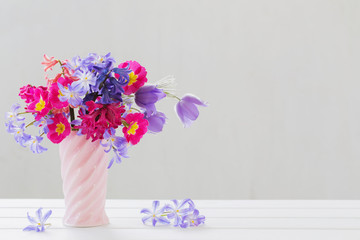 beautiful spring flowers in pink vase