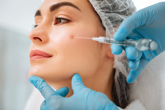 Perfect skin. Close up of a female cheek during the beauty injection