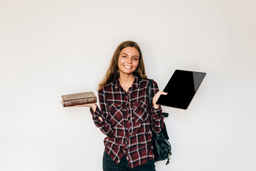 ebooks with book old with new paper book with electronic tablet student holding in her hands copy space