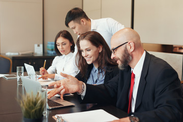 Business people working together at conference table