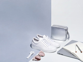 Composition of woman accessories with laptop.