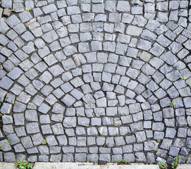 City street stone pavement. Top view on cobblestone street