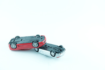 Close up of two cars accident, car crash insurance.Transport and accident concept on white background..