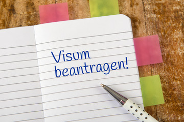 Eintrag im Notizbuch: Visum beantragen