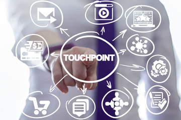 Business woman clicks a touchpoint word button on a virtual panel. Touchpoint Business Social Network concept.