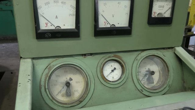 Old electrical equipment. Operating dials and switches on old electrical unit
