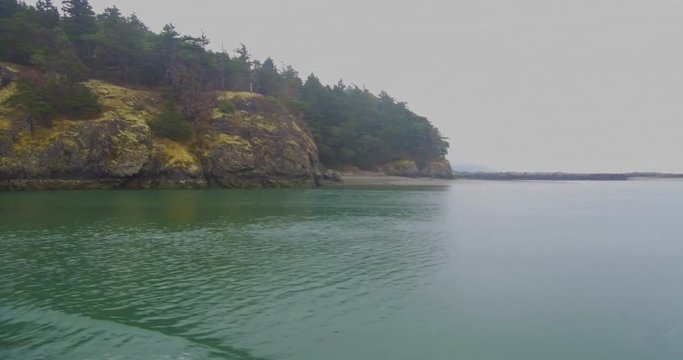 La Conner, WA tourist boat entering Puget Sound on a foggy summer morning