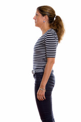 Profile view of mature beautiful woman standing