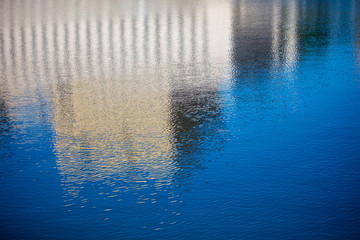 Reflection of a building on the surface of water