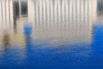 Reflection of a building on the surface of water
