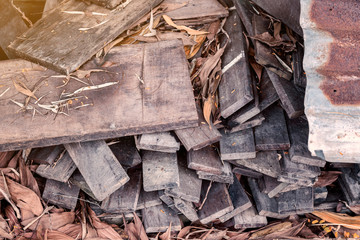 Pile of old wood and old zinc , selective focus and blur.