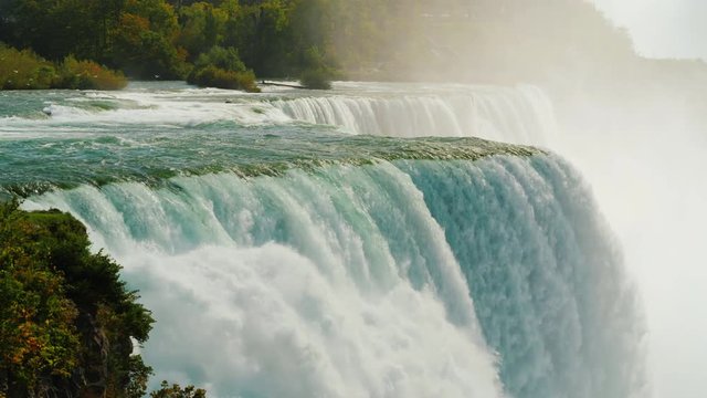 Powerful water flow of the famous Niagara Falls. 4k slow motion