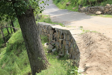 Broken Road Wall In Hilly Areas Of Kashmir