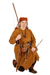 medieval slavic beautiful woman in historical costume. image on white studio background. historical...