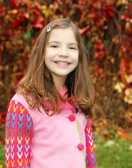 beautiful little girl portrait autumn season