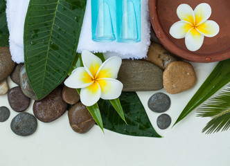 Spa or wellness setting with tropical flowers. Body care and spa concept