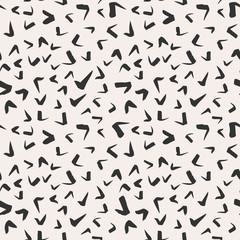 Simple hand-drawn ink doodles, seamless pattern, abstract geometric background. Random brush strokes. Simple and useful ink texture design.