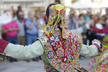 Woman dancing and wearing the traditional folk costume from Zamora (Spain)