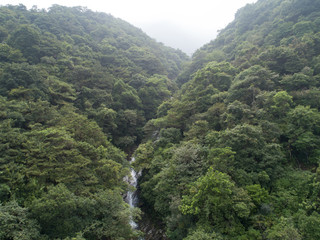 Aerial View of Waterfall in the Tropical Rainforest Mountains