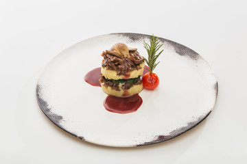 sandwich of cheese and mushrooms in a plate isolated on white background