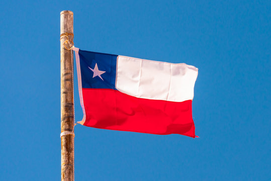 Chilean flag, blue sky background