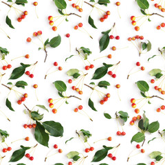 Small apples rolls with leaves isolated on white background, top view, flat layout. Seamless pattern of fresh apples.