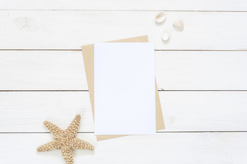 Flat lay with card blank space for you to insert your text, invitation, wedding or logo. Seashells,...