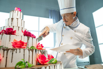The chef knife cuts a big cake
