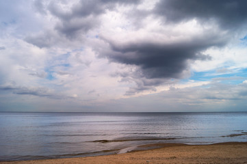 Gloomy blue gray sky and clouds over Lake Ladoga