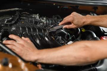 The young mechanic does not study the cause of the malfunction of the car at the service station