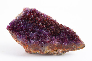 Crystal Stone macro mineral, purple rough amethyst quartz crystals on white background