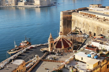 Panoramic skyline view of ancient defences of Valletta, Tree cities and the Grand Harbor, Malta