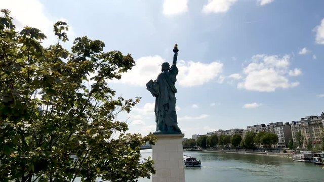 Statue of Liberty in Paris. The statue is smaller than the one in New York. It is located on a small island in the Seine. Back view. 