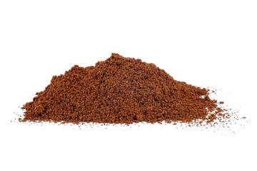 Pile of the ground coffee isolated on white background