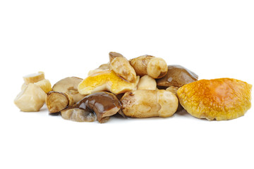 Pile of marinated birch bolete mushrooms isolated on a white background