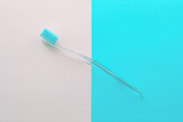 Toothbrush On The Pastel Background Light Pink Blue Colors Mimimal Style Top View Flat Lay Open Space for Text