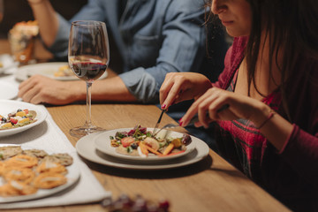 Friends Enjoying at Dinner Party
