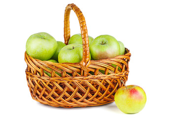 Green apples in wicker basket