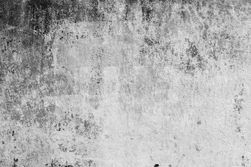 Fototapeta premium Wall fragment with scratches and cracks. It can be used as a background