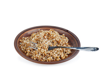 Ceramic plate with boiled buckwheat grains