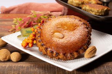 Round Dutch homemade cookies filled with marzipan and almonds nuts, autumn and winter seasonal dessert in Netherlands