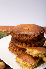 Round Dutch homemade cookies filled with marzipan and almonds nuts, autumn and winter seasonal dessert in Netherlands